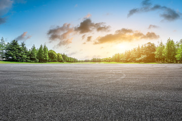 Car drift asphalt square and forest scene at sunrise