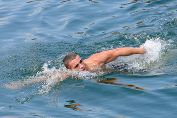  young man swimming