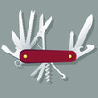 Red multifunctional pocket knife; Swiss Army folding knife, multipurpose penknife isolated 