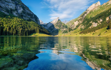 mountains and lake in the switzerland. reflection on the water surface. natural landscape in the swi