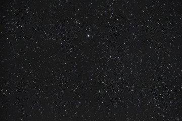 collection of stars in the black night sky without milky way