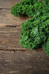 Poster - fresh kale on rustic wooden surface