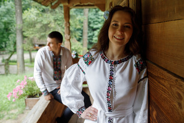  Beautiful bride and groom in the ukrainian style are standing w