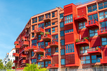 Wall Mural - New red multi-family apartment house seen in Berlin, Germany