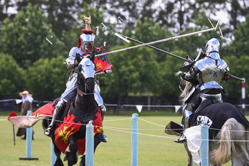 Two medieval knights confront during jousting tournament