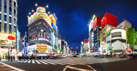 View to night Tokyo in Shinjuku district with lots of neon lights