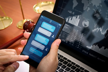 Poster - Chatbot conversation with smartphone screen app interface and artificial intelligence technology processing virtual assistant with customer support information,Lawyer hand holding mobile phone.