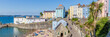 Panoroma of Tenby on a hot summer day, Wales, UK. A picturesque and colorful village on the coast of Wales.