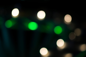 City, street, night defocused, light & blur bokeh. Colorful & dark background.