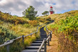 Stairs towards the lighthouse of the Frisian Island of Vlieland. The Frisian Islands, also known as the Wadden Islands or Wadden Sea Islands, form an archipelago at the eastern edge of the North Sea