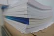 Stack of books for annual Report