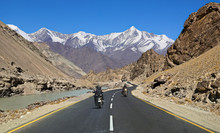 Indian Bikers At Ladakh India Traveling On National Highway Road With Scenic Landscape .
