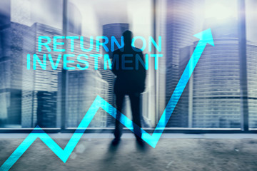 ROI - Return on investment. Stock trading and financial growth concept on blurred business center background.