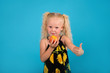 © mischenko - little girl eating a peach