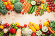 © Liliya Trott - Fresh farm produce, organic vegetables on wooden pine table, healthy background, copy space for text, top view, selective focus