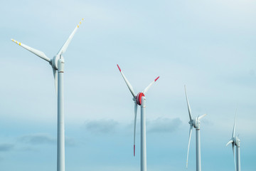 Wind generators turbines and blue sky.