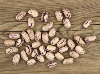 Haricot beans on wooden background, beans background