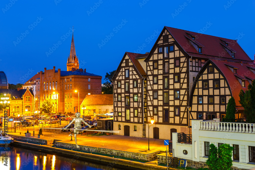 The waterfront  with famous granaries at night in Bydgoszcz, Poland - obrazy, fototapety, plakaty 