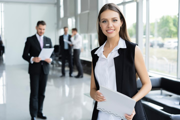 Poster - Modern business woman in the office with copy space.