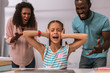 © Viacheslav Yakobchuk - I dont want to hear. Unhappy stressed out girl covering her ears while not wanting to listen to her parents