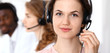 © rogerphoto - Call center operator.Young beautiful  brunette woman in headset. Business concept