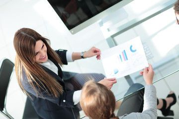 Sticker - top view.employees work with financial documents