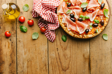 Wall Mural - Italian pizza on wooden table