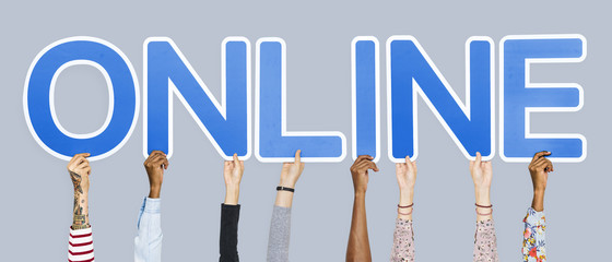 Wall Mural - Hands holding up blue letters forming the word online