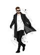 A handsome man in a long coat, trousers, shoes and glasses. Fashionable look. Vector illustration for a postcard or a poster, print for clothes. Fashion & Style.