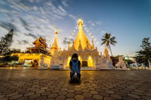 Young Woman Traveler Sitting While Praying With White Pagoda At Wat Phra That Doi Kong Mu Temple In Mae Hong Son Province Near Chiang Mai, Thailand
