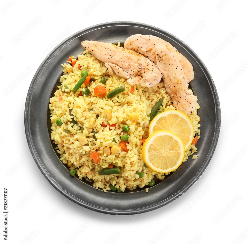 Tasty boiled rice with meat and vegetables on plate, isolated on white