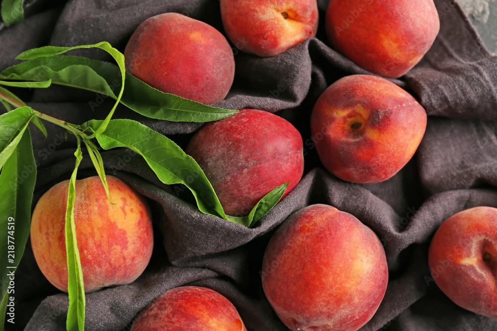 Fresh peaches on napkin