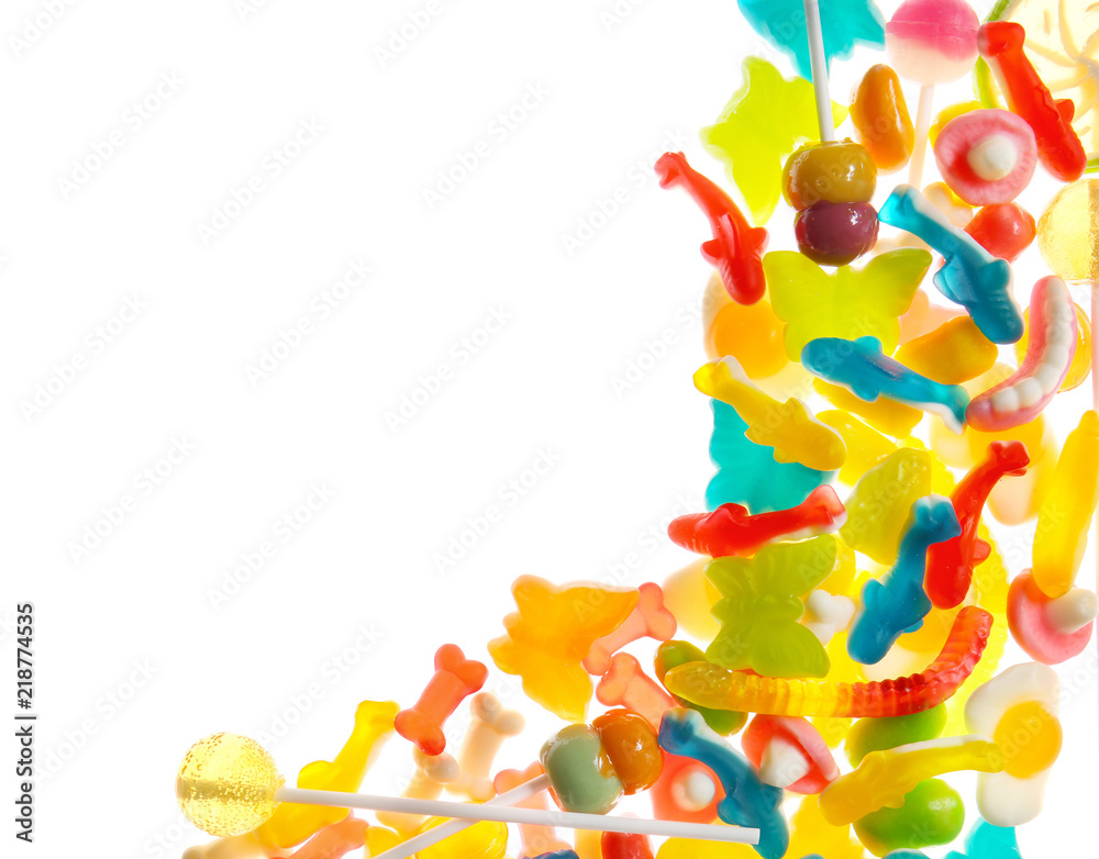 Assortment of colorful candies on white background