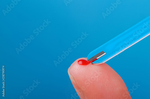 Fotomural Blood test from a finger to a close-up diabetes. Diabetes concept