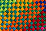 Diagonally angled interweaving threads of fabric
