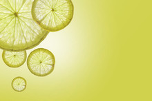Flat Lay Slice Of Lemon On Green Background , Space For Text
