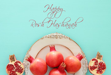 Rosh hashanah (jewish New Year holiday) concept. Pomegranate raditional symbol.