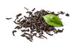 Heap of dried black tea leaves isolated on white background.