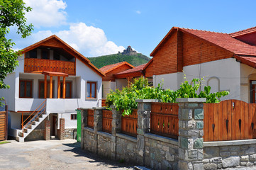 Streets of Mtskheta town and JvStreets of Mtskheta town and Jvari Monastery on a hill, Georgiaari Monastery on a hill, Georgia