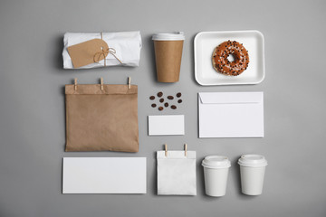 Wall Mural - Flat lay composition with items for mock up design on gray background. Food delivery service