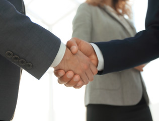 Close up business man handshake together on meeting room