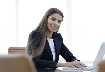 young business woman working on laptop