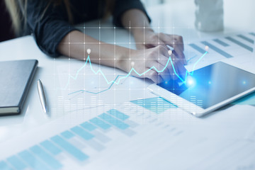 Diagrams and graphs on virtual screen. Business strategy, data analysis technology and financial growth concept.