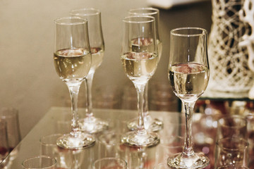 Wall Mural - Luxury champagne glasses on table in restaurant close-up, elegant business reception party, corporate dinner party concept, expensive tableware