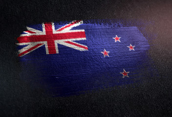 Wall Mural - New Zealand  Flag Made of Metallic Brush Paint on Grunge Dark Wall