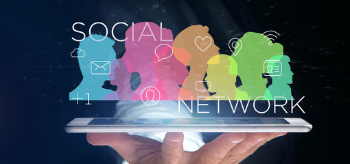 Poster - Businessman holding a colorfull social network teamwork with icon 3d rendering