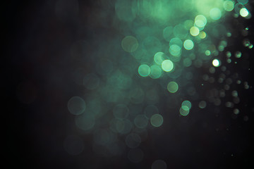 bokeh of water fly and lights on black background