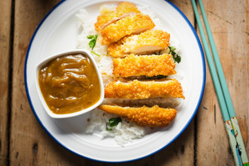 Wall Mural - Crispy Katsu Chicken Curry with rice & parsley 