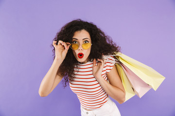 Wall Mural - Portrait of an excited young casual woman