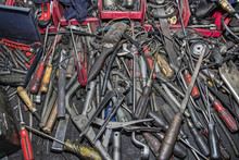 Bunch Of Messy Hand Tools In An Auto Mechanic Garage